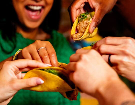 Group Eating Tacos